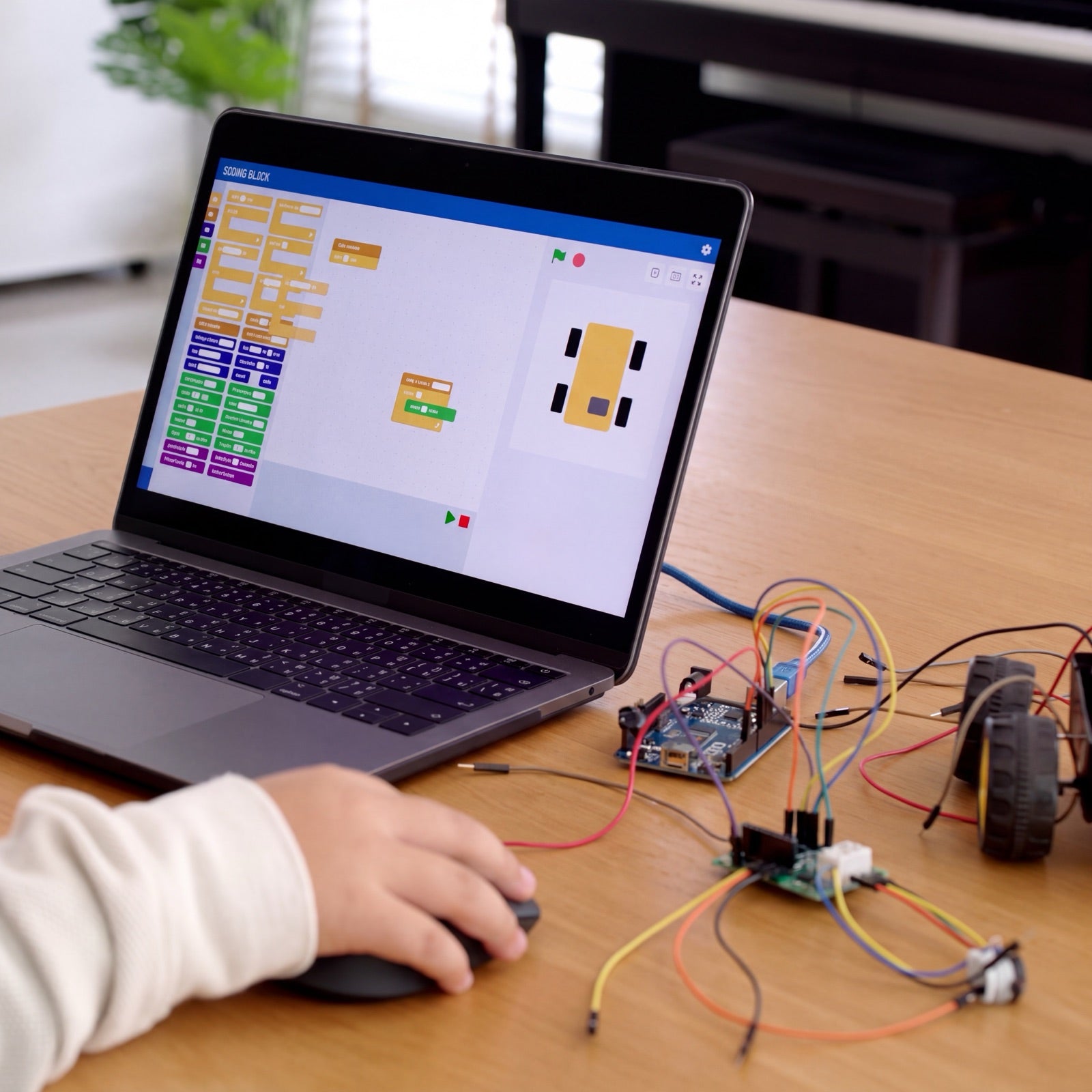 De robot programmeren op een laptop met blokken-lesmodules